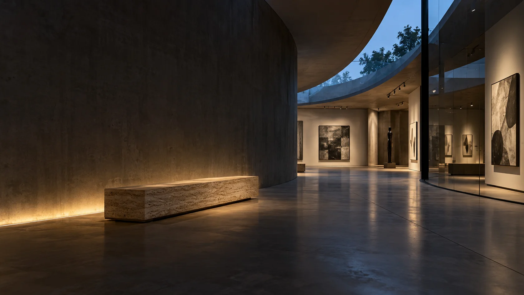 An intimate contemporary gallery with curved walls, warm lighting and blue evening light